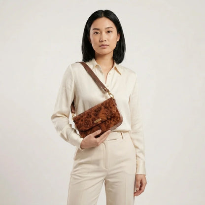Atlas Saddle Bag open interior showing handcrafted leather compartments